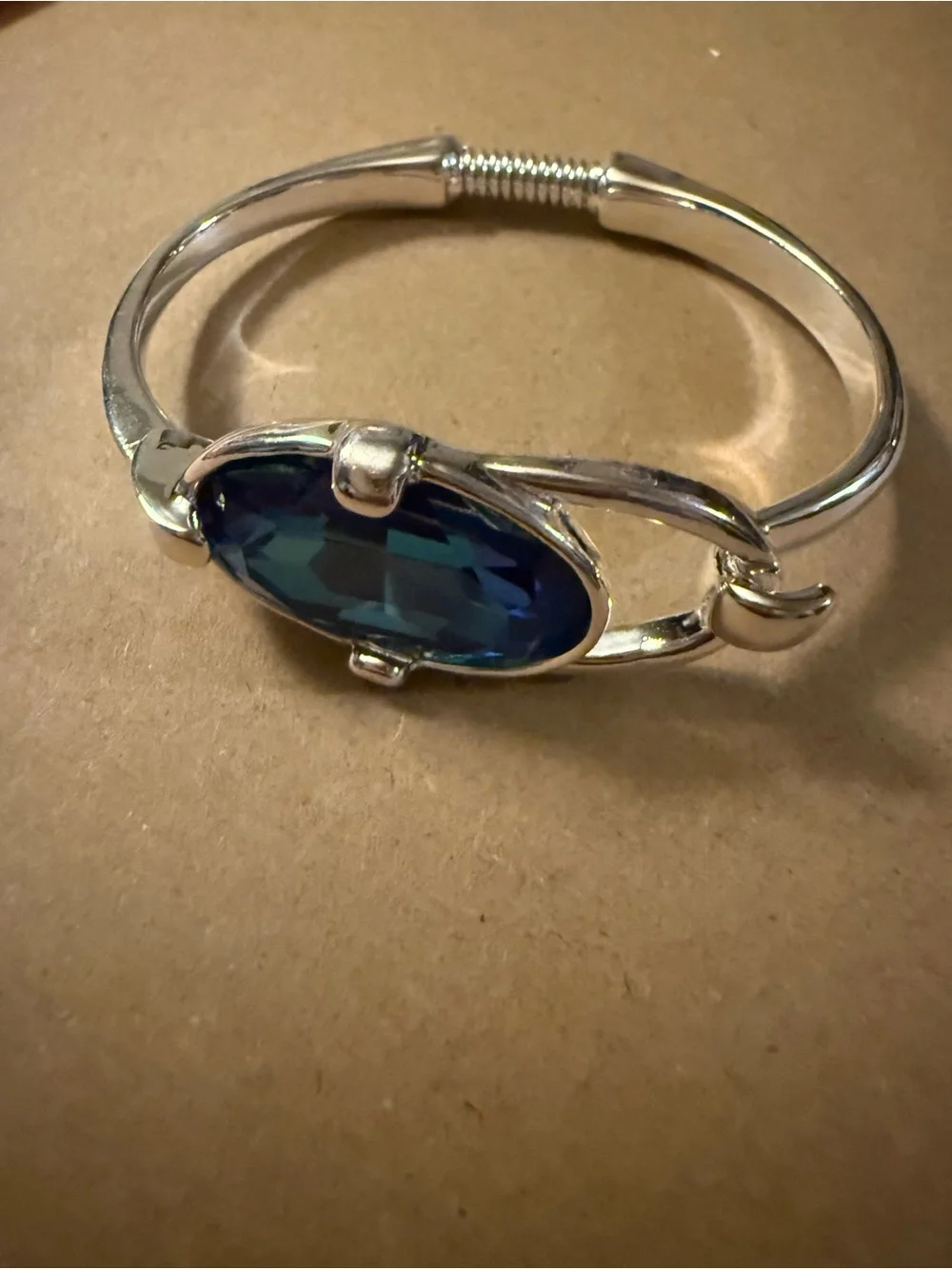 Uno de 50 bangle bracelet with faceted blue crystal